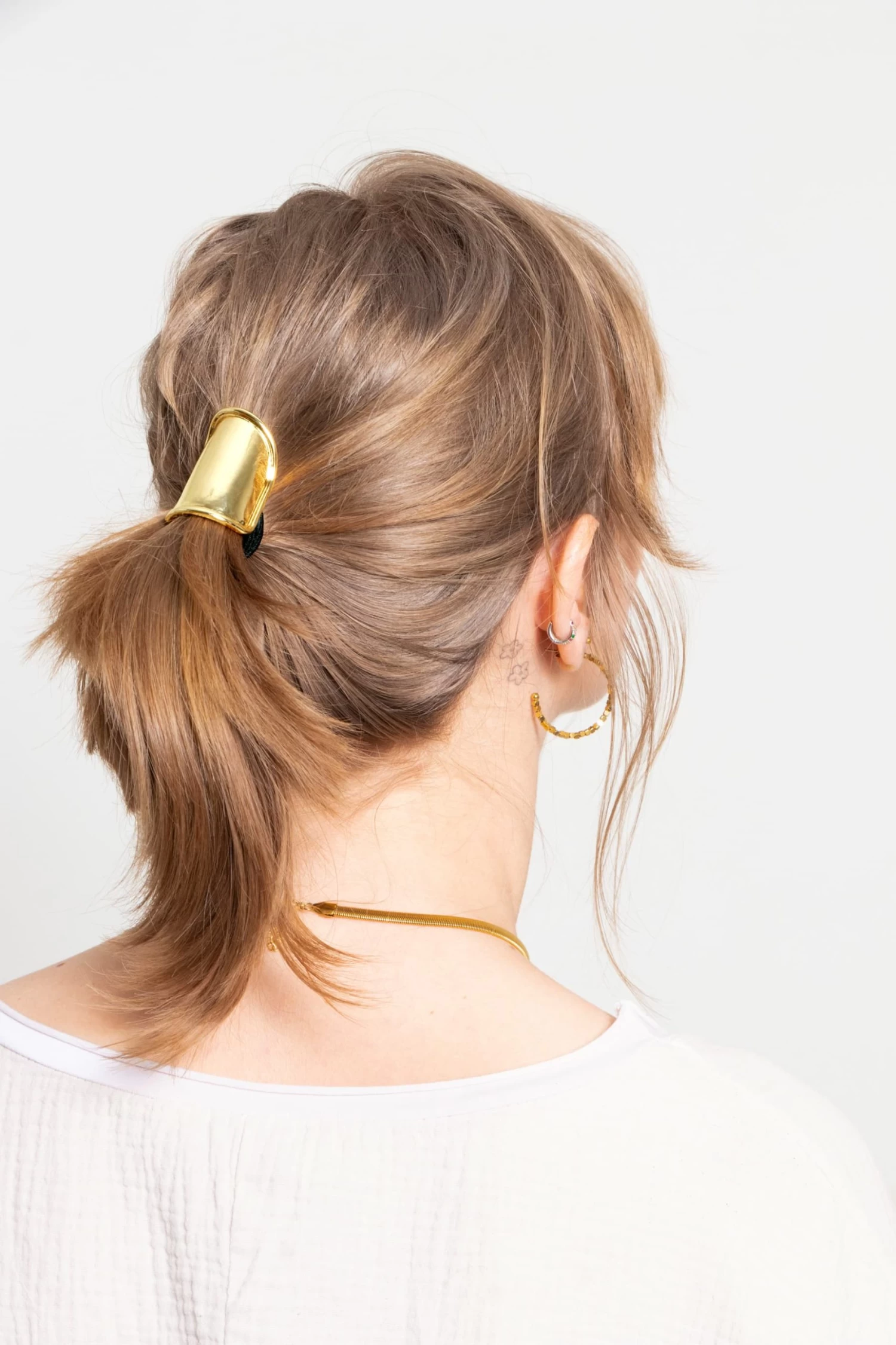 Haargummi Mit Ovalem Design - Gold 4 Haargummi Mit Ovalem Design - Gold – Bild 2